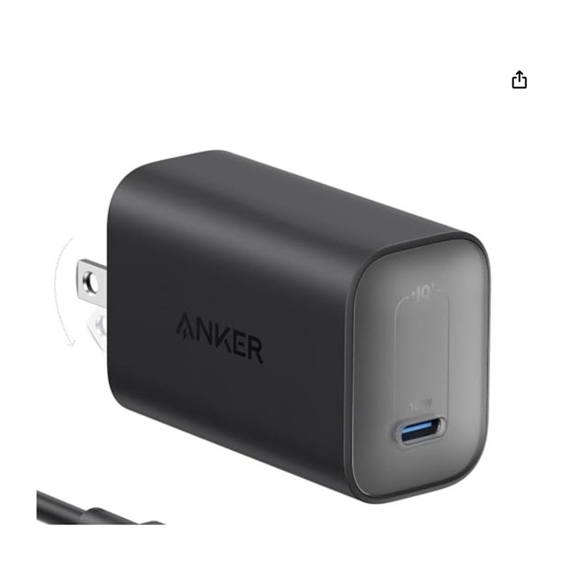Anker 100W Foldable Charger — compact laptop charger with folded prongs, shown at scale