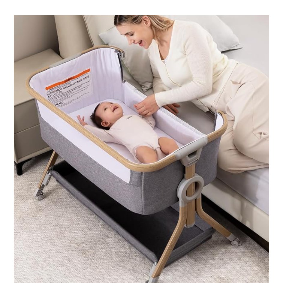 Larex 3-in-1 Bedside Bassinet — bassinet next to a bed, shown at scale