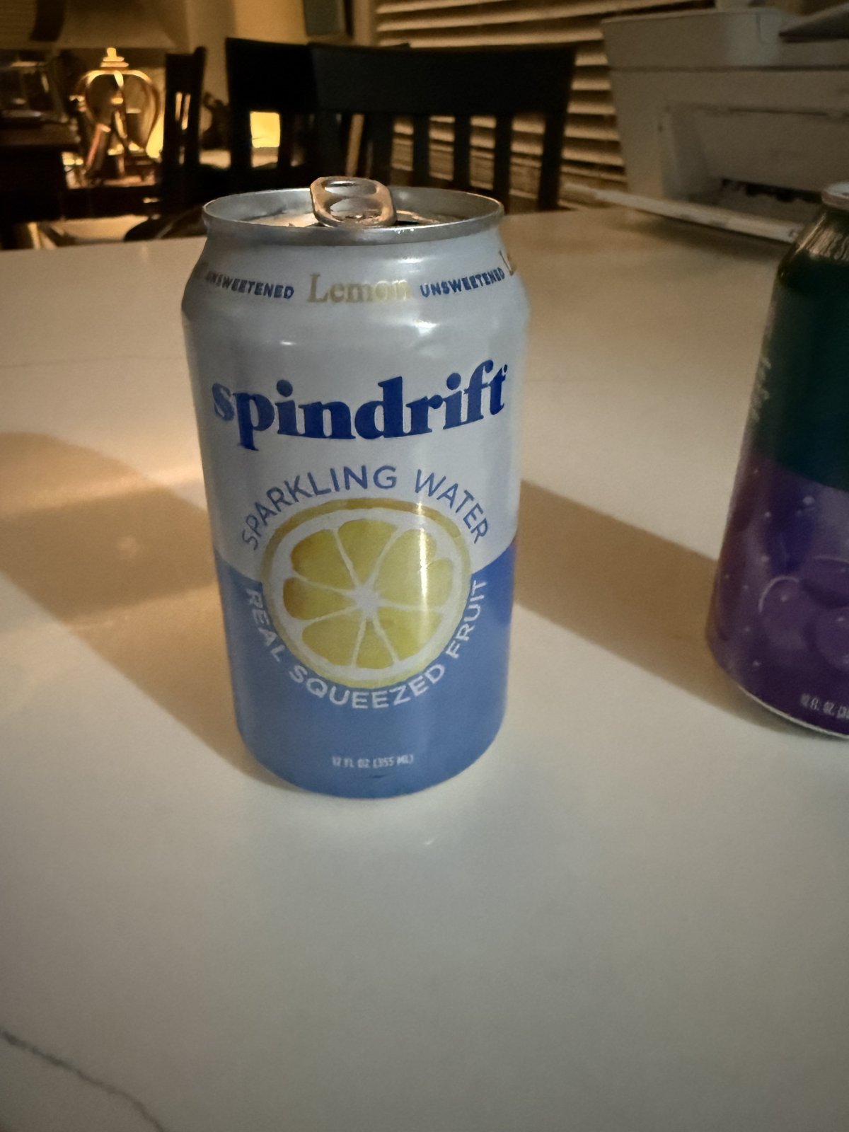 Spindrift Sparkling Water, Lemon — sparkling water cans in a case, shown at scale
