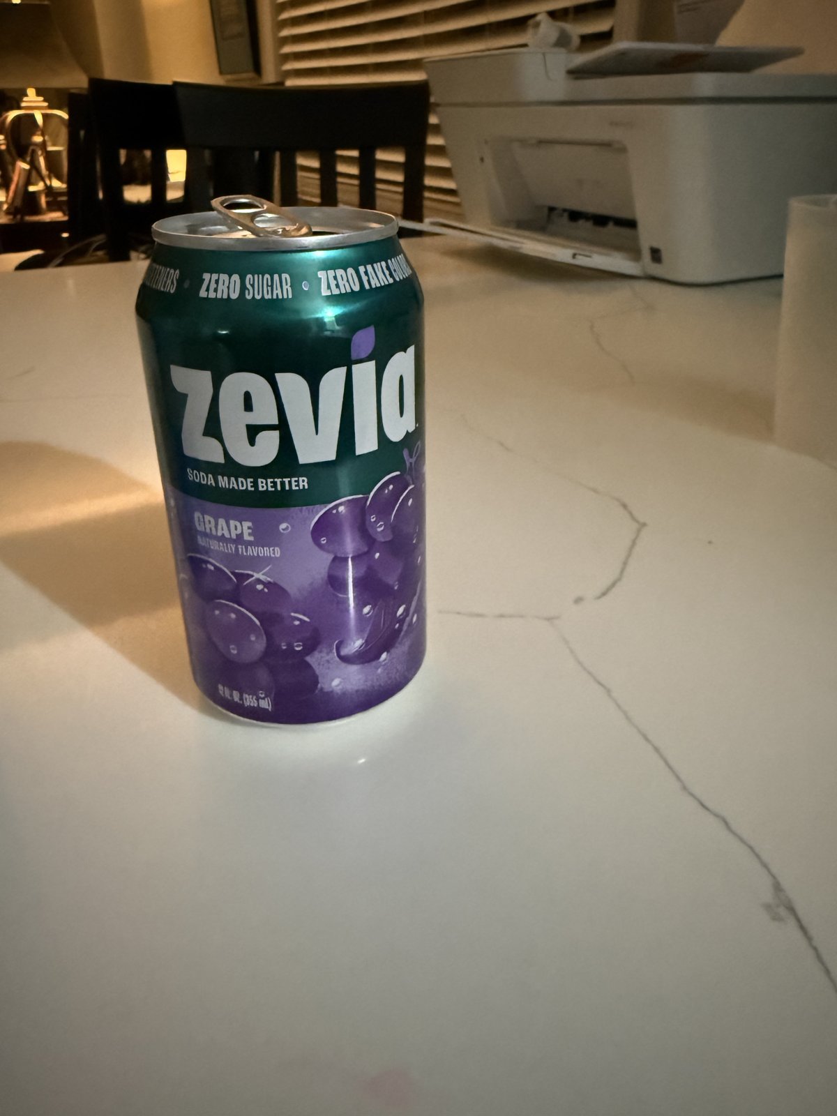 Zevia Zero Sugar Soda, Grape — soda cans in a case, shown at scale